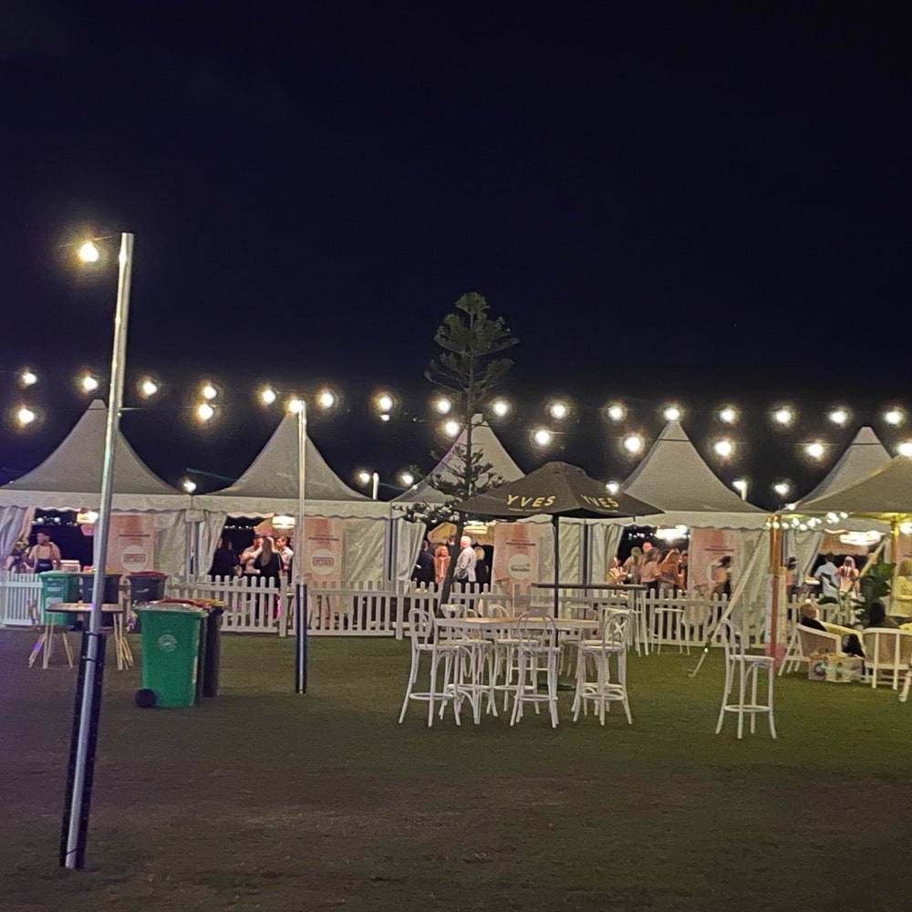 Moreton Bay Food and Wine Festival. Outdoor eating area with multiple tents. Live event audio Brisbane, Gold Coast, Sunshine Coast